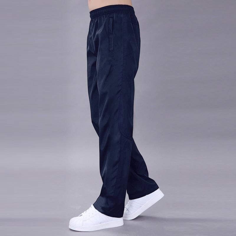 Herrbyxor Träningsbyxa Snabbtorkande Andningsbyxor Vårsportbyxa Elastisk midja Rak Bred joggingbyxa Löparträningsoverall Herr L blå
